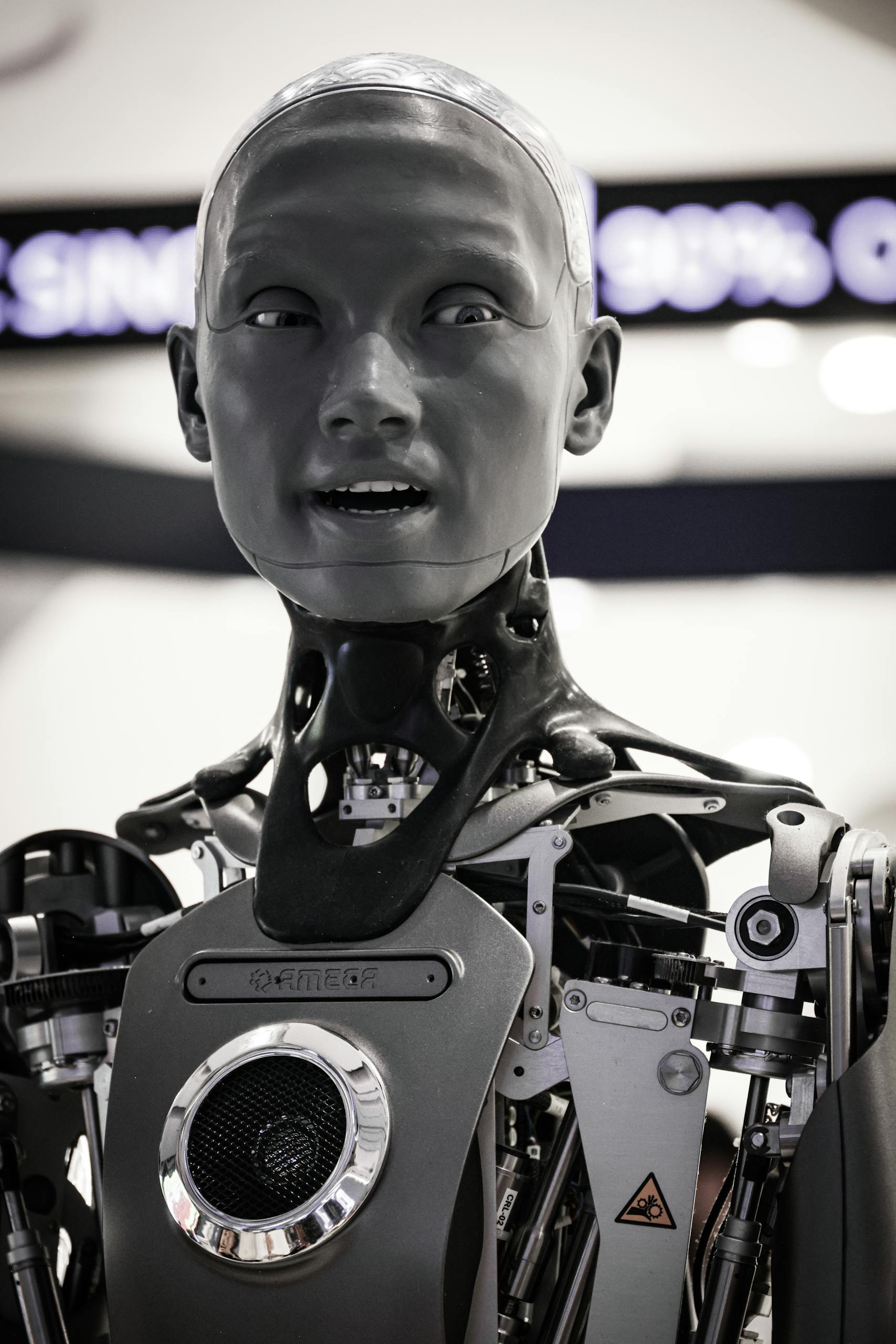 A detailed image of a humanoid robot showcasing advanced robotics technology at an exhibition.